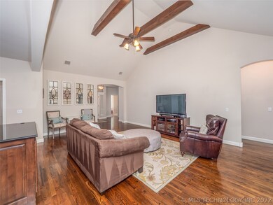Vaulted, Beamed Family Room with stunning hardwood