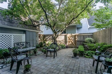 Private stone patio perfect for entertaining.