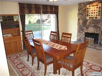 Dining area with fireplace view