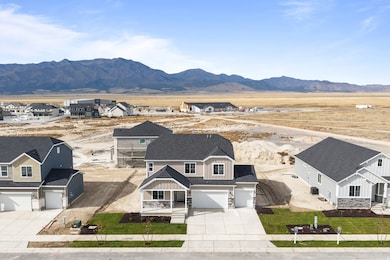 Aerial view of residential area featuring mountains