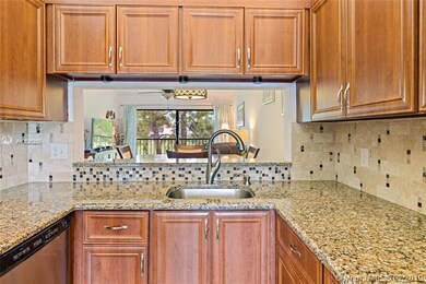 Kitchen with quartz countertops and stainless stee