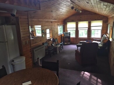 A large living room with plenty of...