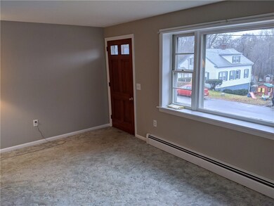 Walk to all the events in downtown Westerly from a convenient rental Ranch at 32 Spring Street just off of Cross Street. The living room opens up to the kitchen and dining room while down the hall are the three bedrooms with nice hardwood floors and a bathroom.  Next to the kitchen is a three season porch with both windows and screens.  The attached garage is part of the unfinished basement. The backyard is perfect for grilling and badminton!  Check it out!