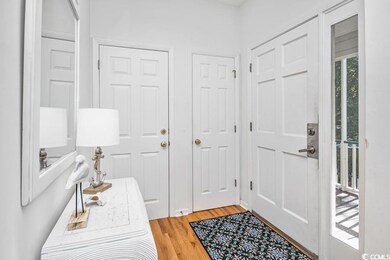 Foyer featuring light wood-type flooring