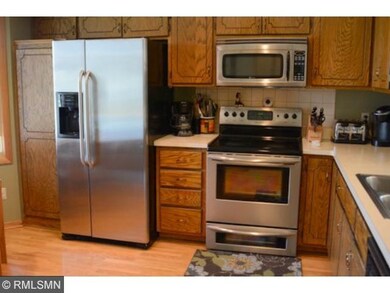 The inviting kitchen has nice windows for morning 