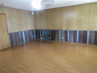 Unfurnished room featuring ceiling fan and light w