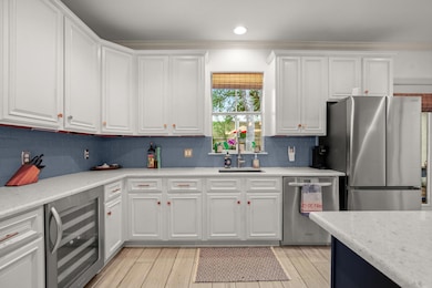 Kitchen featuring appliances with stainless steel