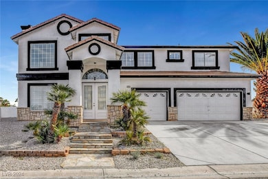 View of front of home featuring french doors, ston