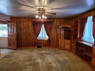 Family room with built in cabinets