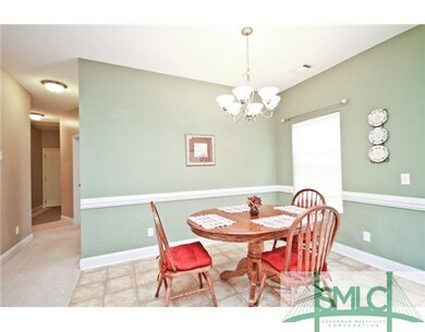 Dining Room. The Dining Room is Open to the Kitche