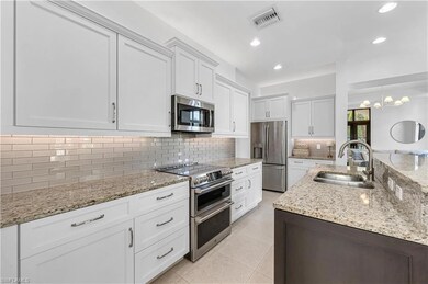 Kitchen with appliances with stainless steel finis