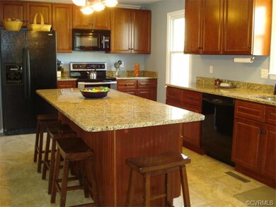 The large Eat-In Kitchen also features a 7 foot Gr