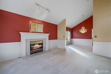 Living rooms opens to formal dining room.