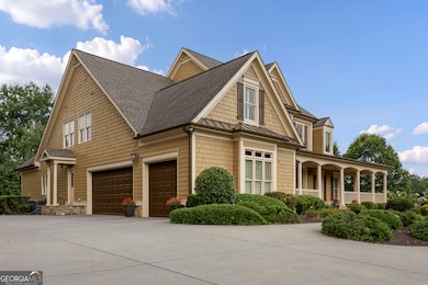 Side entry, 3 car garage, circular and linear driveway.  Plenty of parking