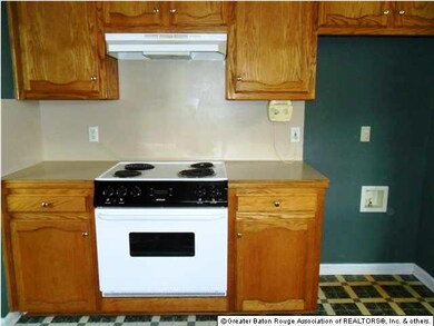 Kitchen - stove with refrigerator space on right