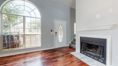 Large picture window in the front. The home has a wood burning fireplace. 