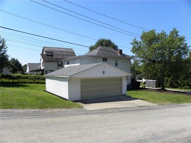 This two-car detached garage will keep your vehicl