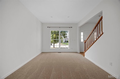 Living Room or Office open to formal diiming room. New Paint and New Carpet