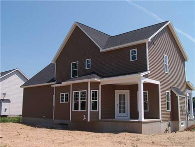 Exterior Back Back of home features covered outdoo