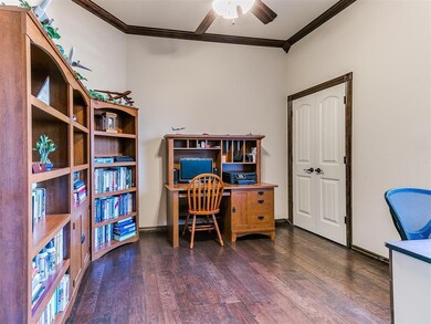 Office featuring dark wood-type flooring, ceiling 