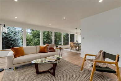 A wall of windows greets you - overlooking backyard and city view.