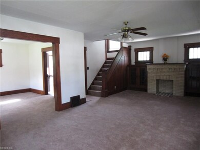Spacious living room looking into the dining room