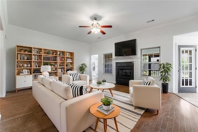 Living room is generously sized anchored by a gas