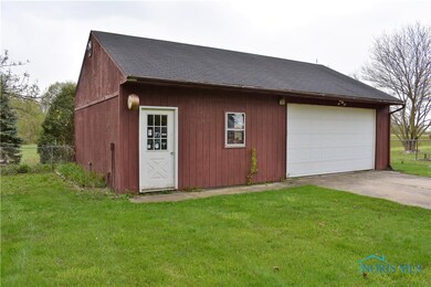 24x36 detached garage w/ opener & floored attic!
