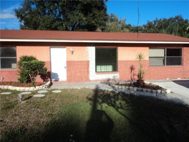 View of the front from street before we painted ar