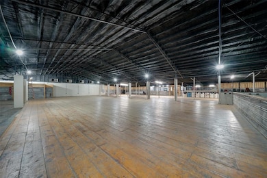Miscellaneous room featuring lofted ceiling and wo