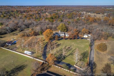 The home has a circular paved driveway. There is s