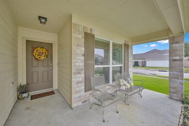 Enjoy your morning coffee or your evening wine on this spacious covered front porch!