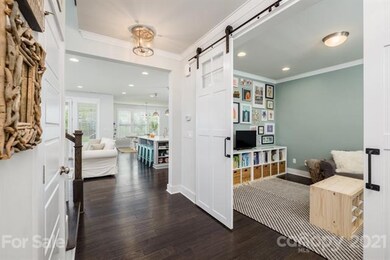 Entryway, barn doors to flex room, office , or pla