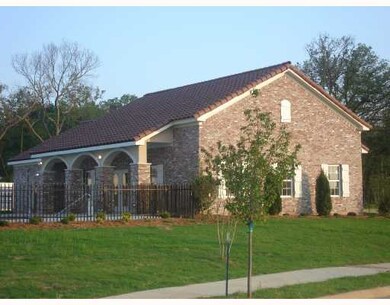 Exterior Back. Back covered porch of the Tuscany C