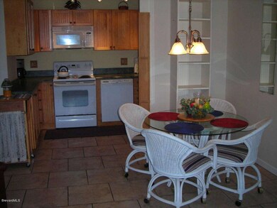 Open Kitchen and Dining Areas