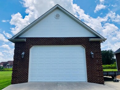 24 x 36 detached garage with RV hook-up, 10 ft. door, 12 ft. walls & loft area for storage!
