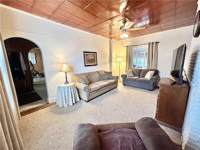 living room with ceiling light fan