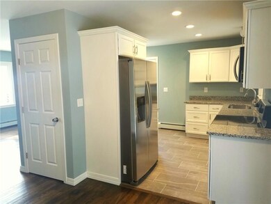 Kitchen, entry to basement, slight...