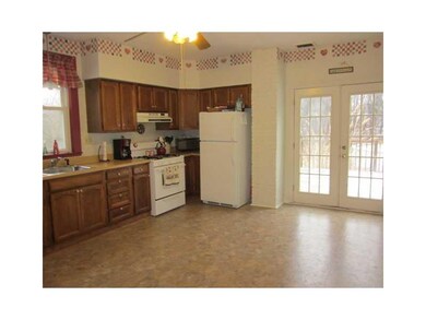 Kitchen. Generous eat-in kitchen with lovely oak c