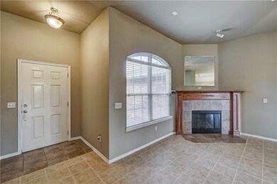 Living area with fireplace.  Includes all blinds