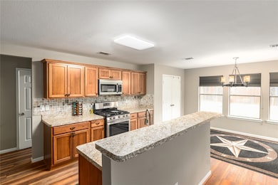 Kitchen is open to dining area
