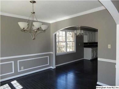 Look at the detailed wainscoting and archways