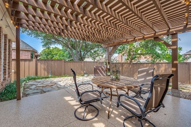 Fenced backyard with patio, pergola and some shade!