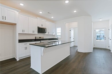 Kitchen with Granite Countertops and Center Island
