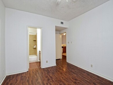 Unfurnished bedroom featuring a textured ceiling,