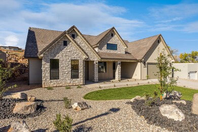 View of front of home with covered porch, stone siding, concrete driveway, and stucco siding