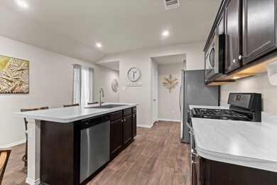 There is ample pantry and cabinet storage for all your cooking needs.