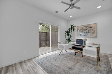 Secondary bedroom with tile floors, recessed light