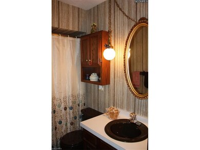 Guest bathroom conveniently located on main level.