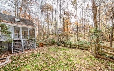 View of yard featuring a sunroom